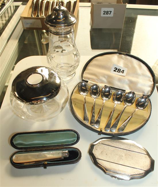 Small silver items- 6 coffee spoons, pocket knife, compact, tidy, caster